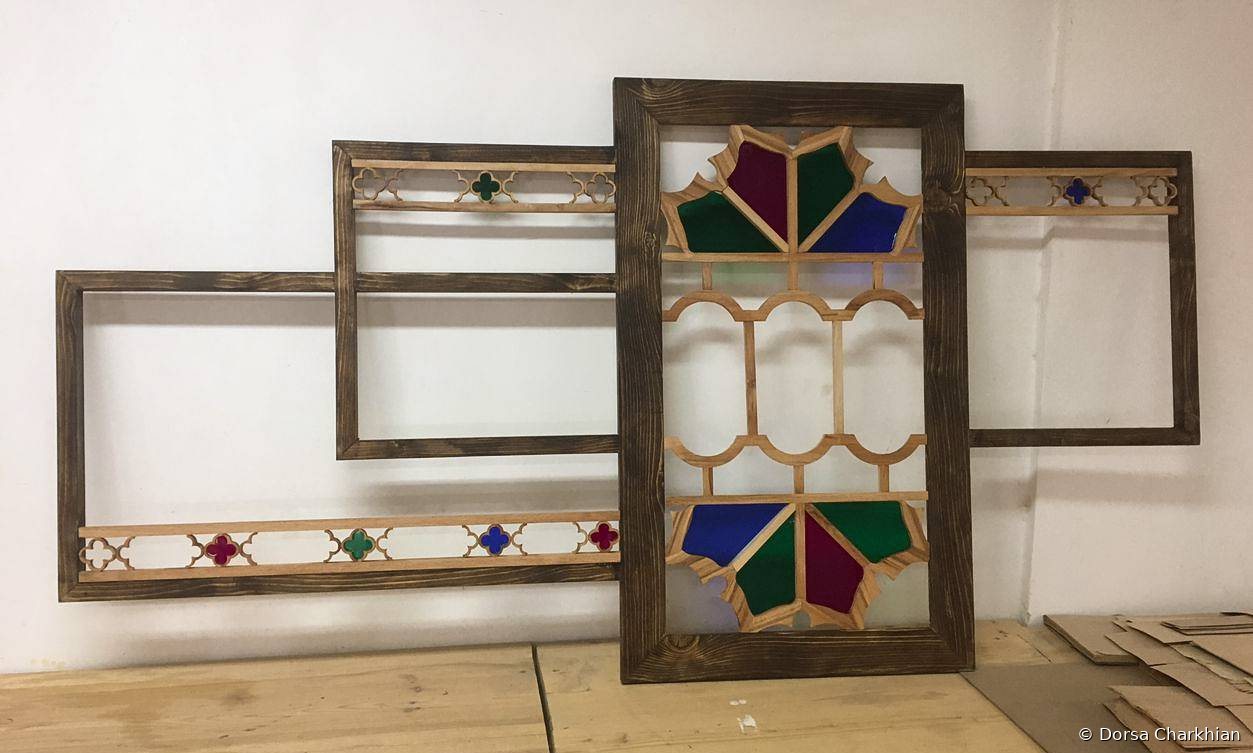 HEG Lighting, 2021. The finished piece: wood, colored glass and an orosi lattice in layered frames.